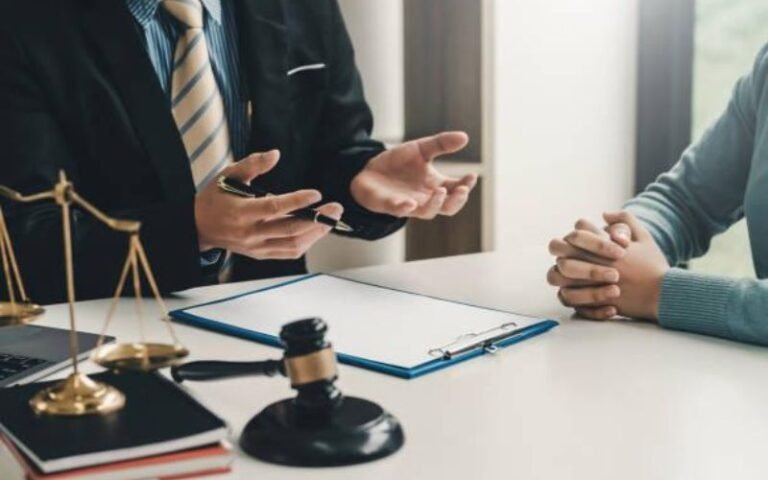 Licensed attorney explaining who can represent you in court during client consultation