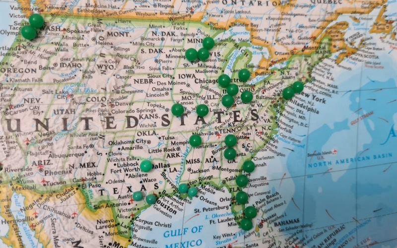 Map of the United States with green pins marking multiple states across different jurisdictions